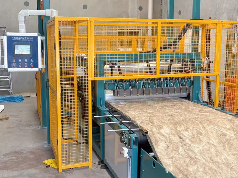 Adhesive spray lamination machine